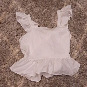 Open- back shirt from love by Chelsey